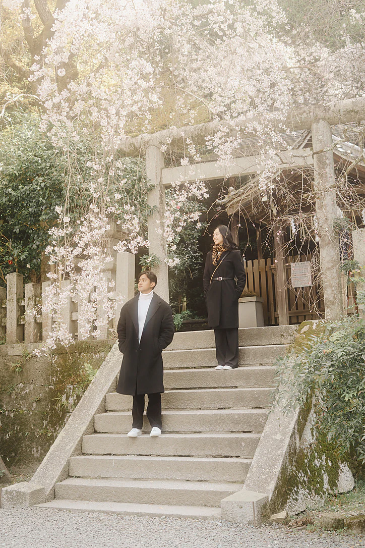 Priam and Eden together under cherry blossoms